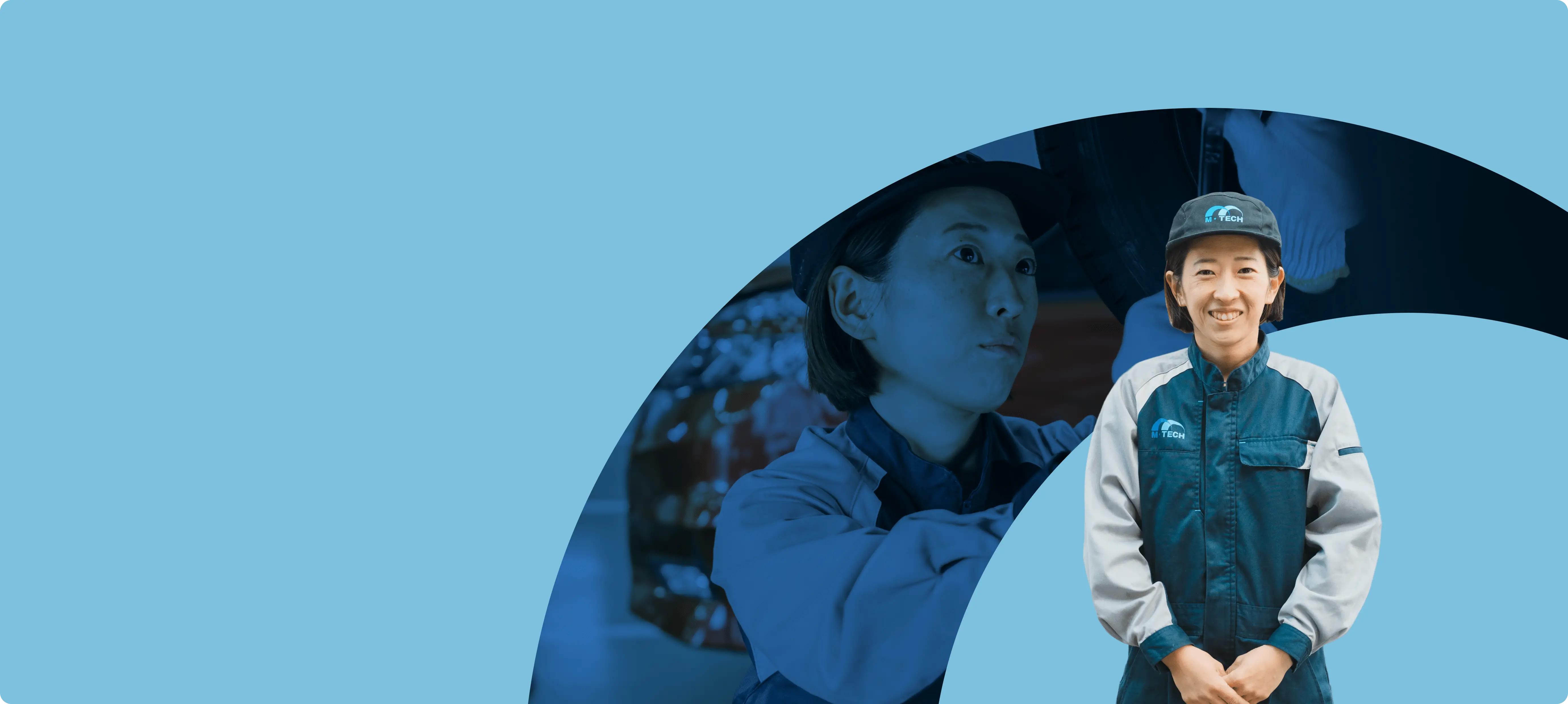 先輩社員がにこやかな笑顔で立っている様子